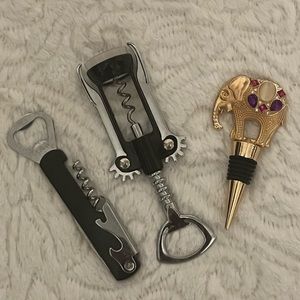 Set of two wine openers and jeweled wine stoppers